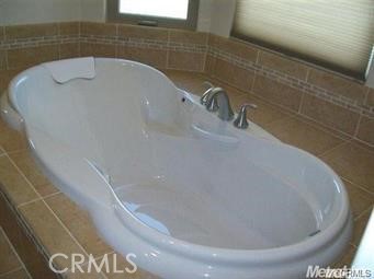 20552 Buchanan Hollow Road Le Grand, CA 95333 - Photo 21 of 26 a close view of a bathtub in bathroom