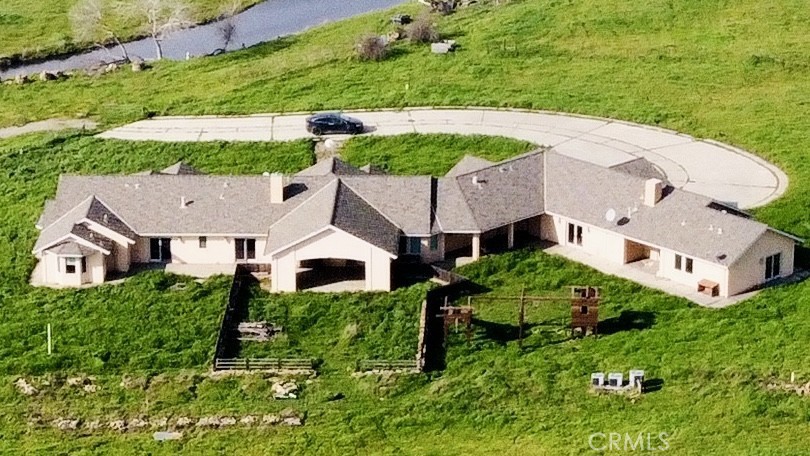 20552 Buchanan Hollow Road Le Grand, CA 95333 - Photo 4 of 26 an aerial view of a house