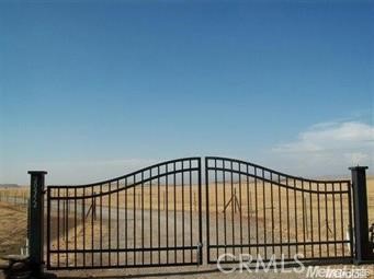20552 Buchanan Hollow Road Le Grand, CA 95333 - Photo 8 of 26 a view of staircase with a black gate