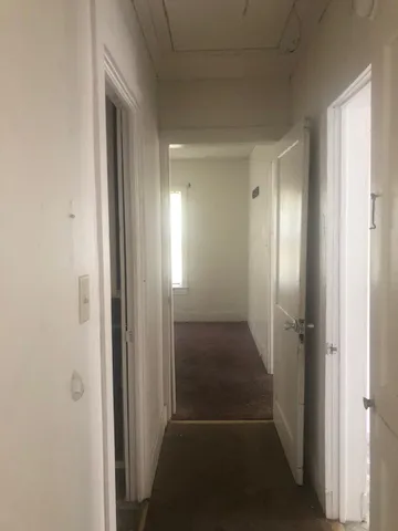 an empty room with an entryway