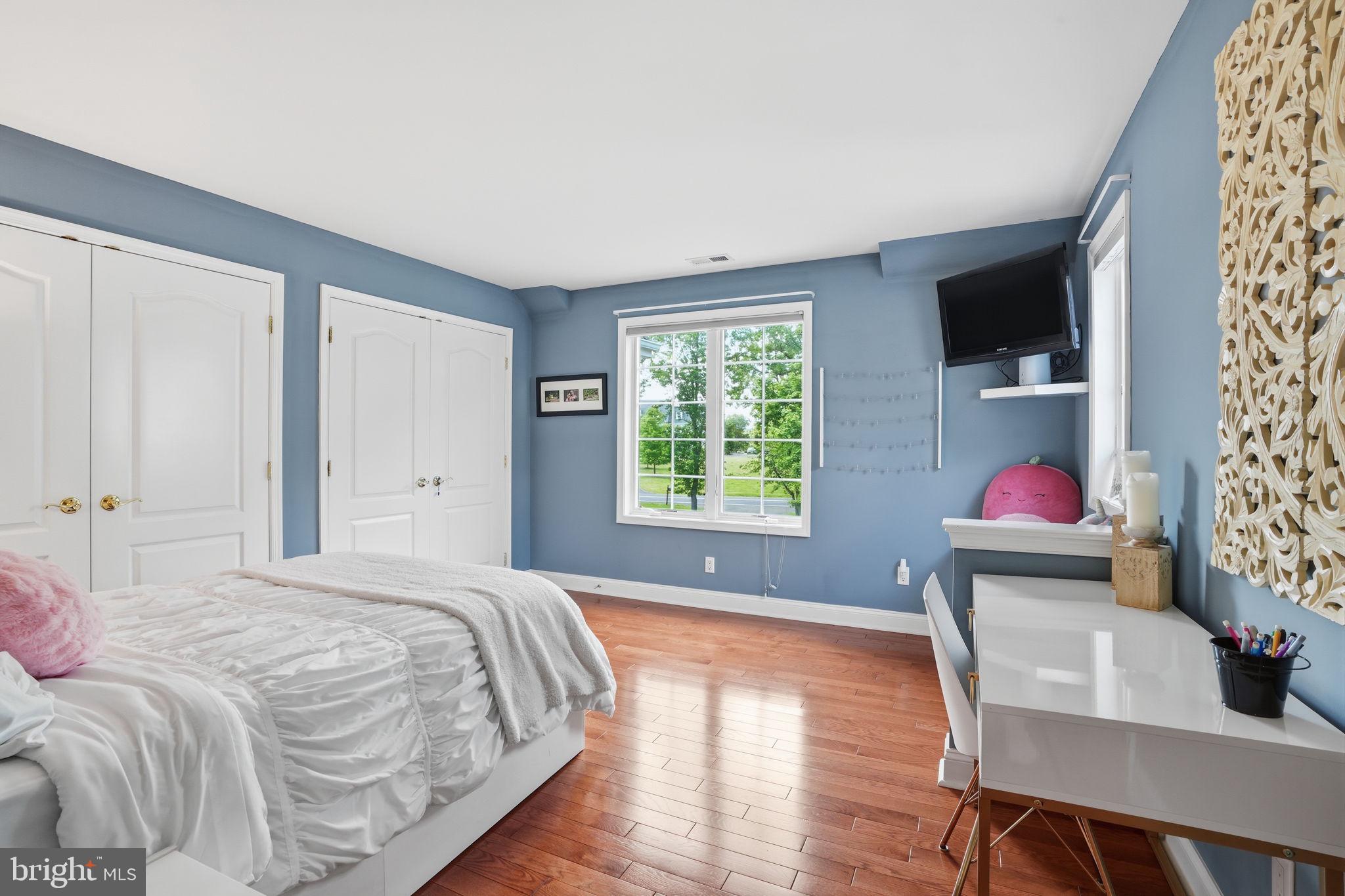 1588 Wrightstown Road Newtown, PA 18940 - Photo 55 of 81 a bedroom with a bed and a table