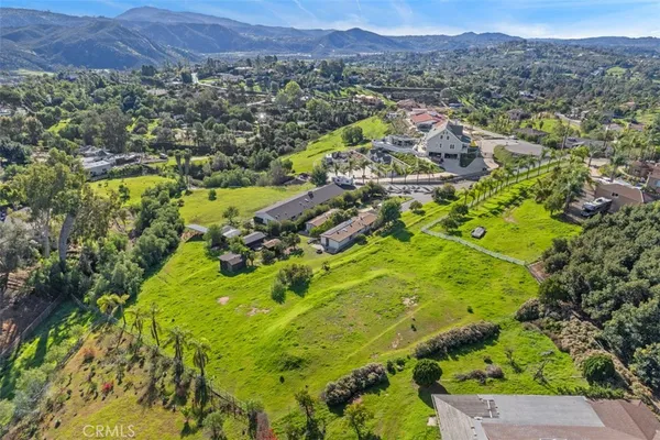 a view of a city with mountains in the background