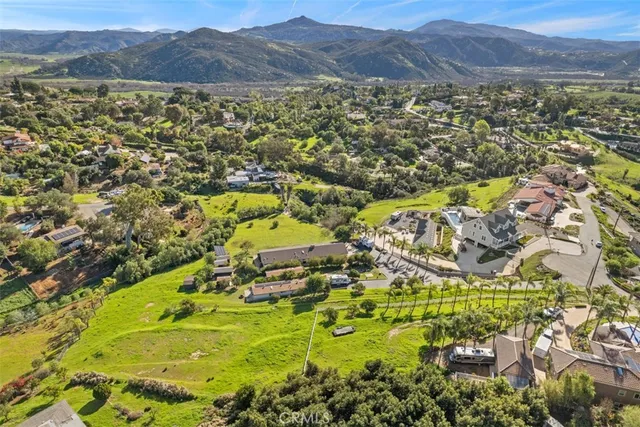 a view of a city with mountains in the background