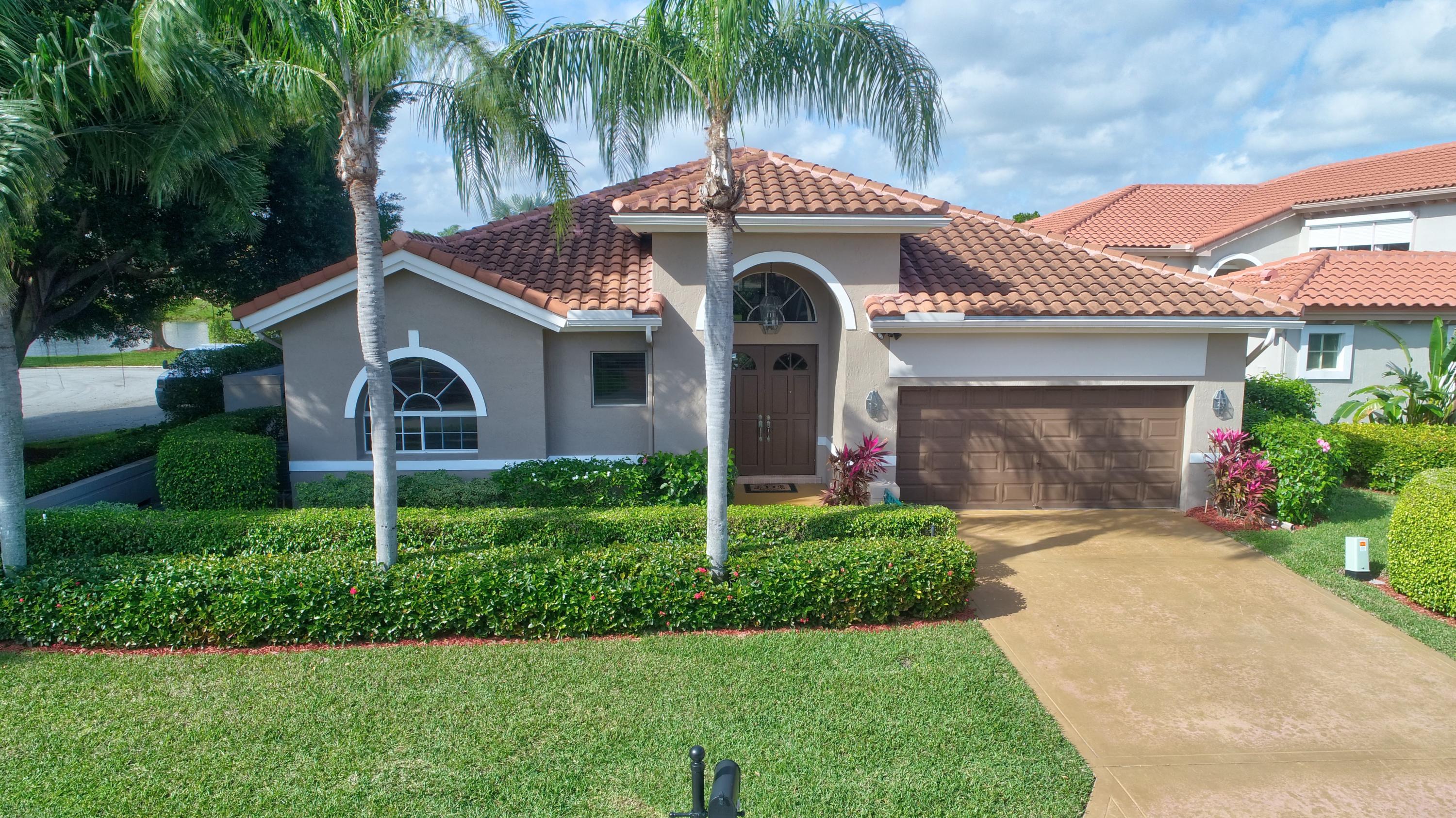 2301 Northwest 25th Way Boca Raton, FL 33434 - Photo 2 of 52 Front of House