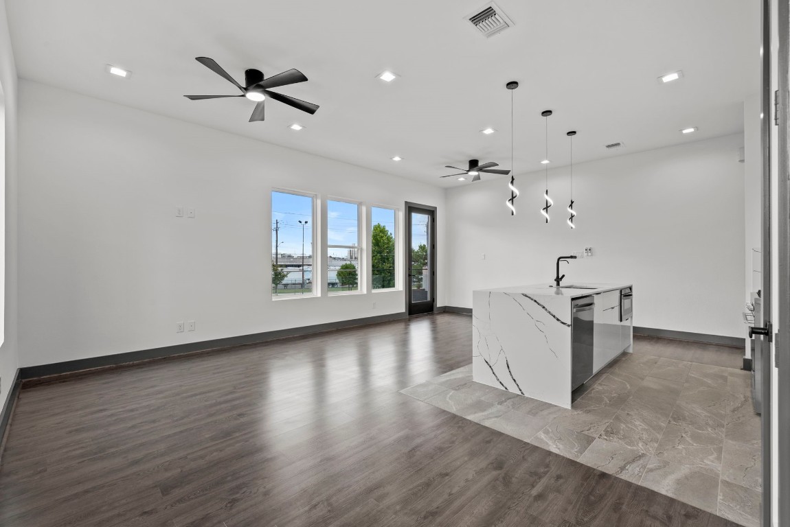 3114 Clay Street Houston, TX 77003 - Photo 11 of 28 wooden floor in an empty room with a window