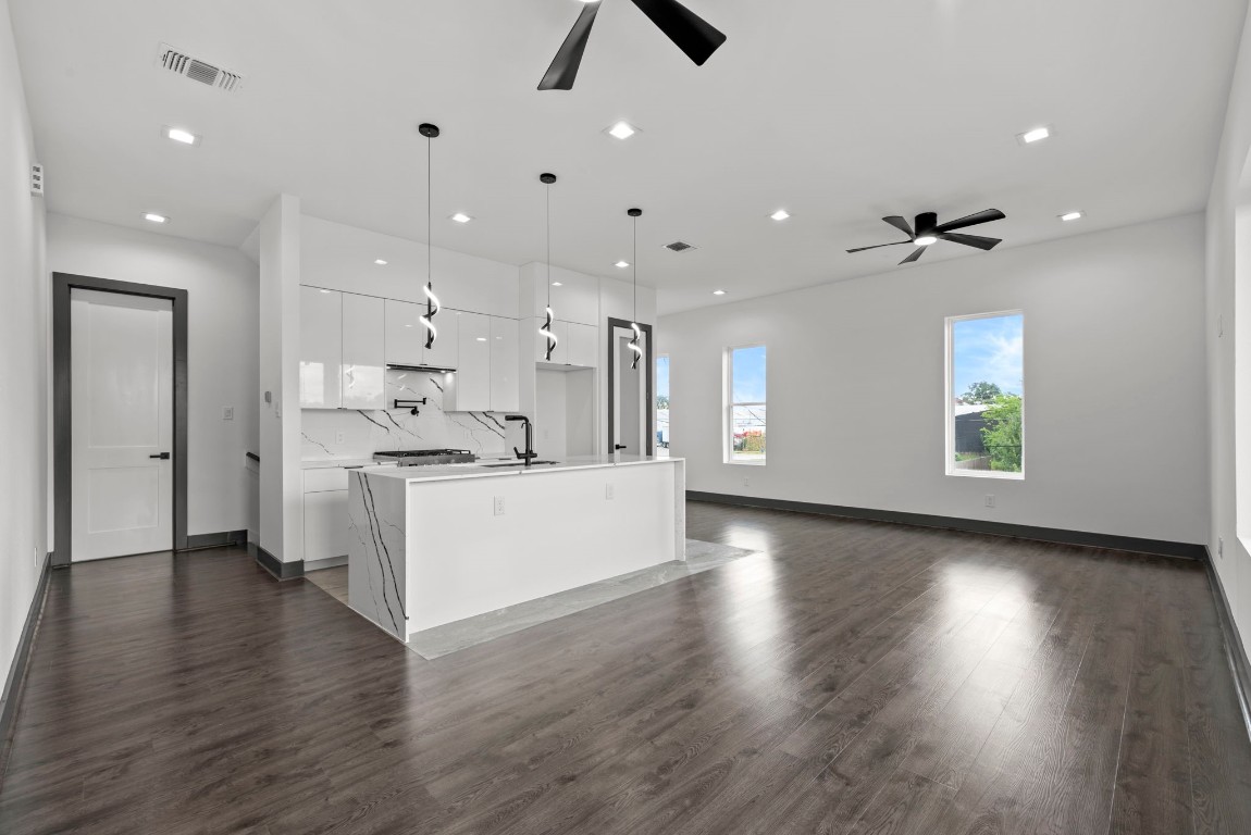 3114 Clay Street Houston, TX 77003 - Photo 13 of 28 a view of kitchen with sink and wooden floor