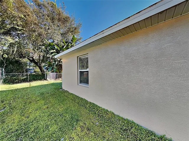 a view of a backyard with a garden