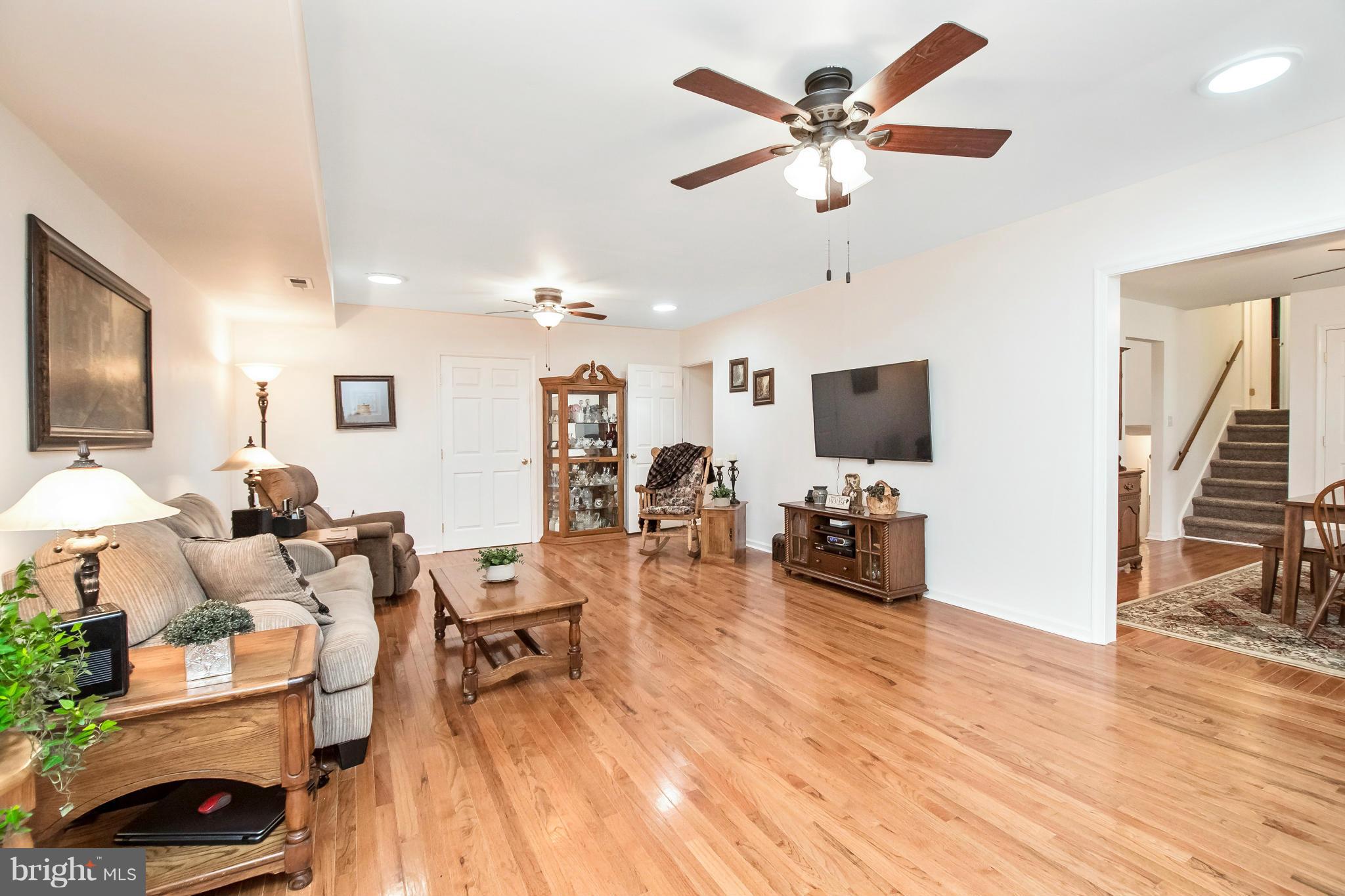 6101 Ridge Tree Road Fredericksburg, VA 22407 - Photo 13 of 30 a living room with furniture and a flat screen tv