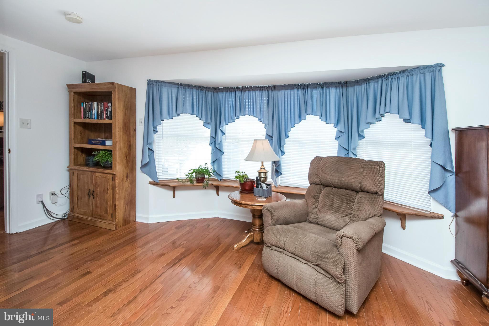 6101 Ridge Tree Road Fredericksburg, VA 22407 - Photo 25 of 30 a living room with furniture a rug and a window