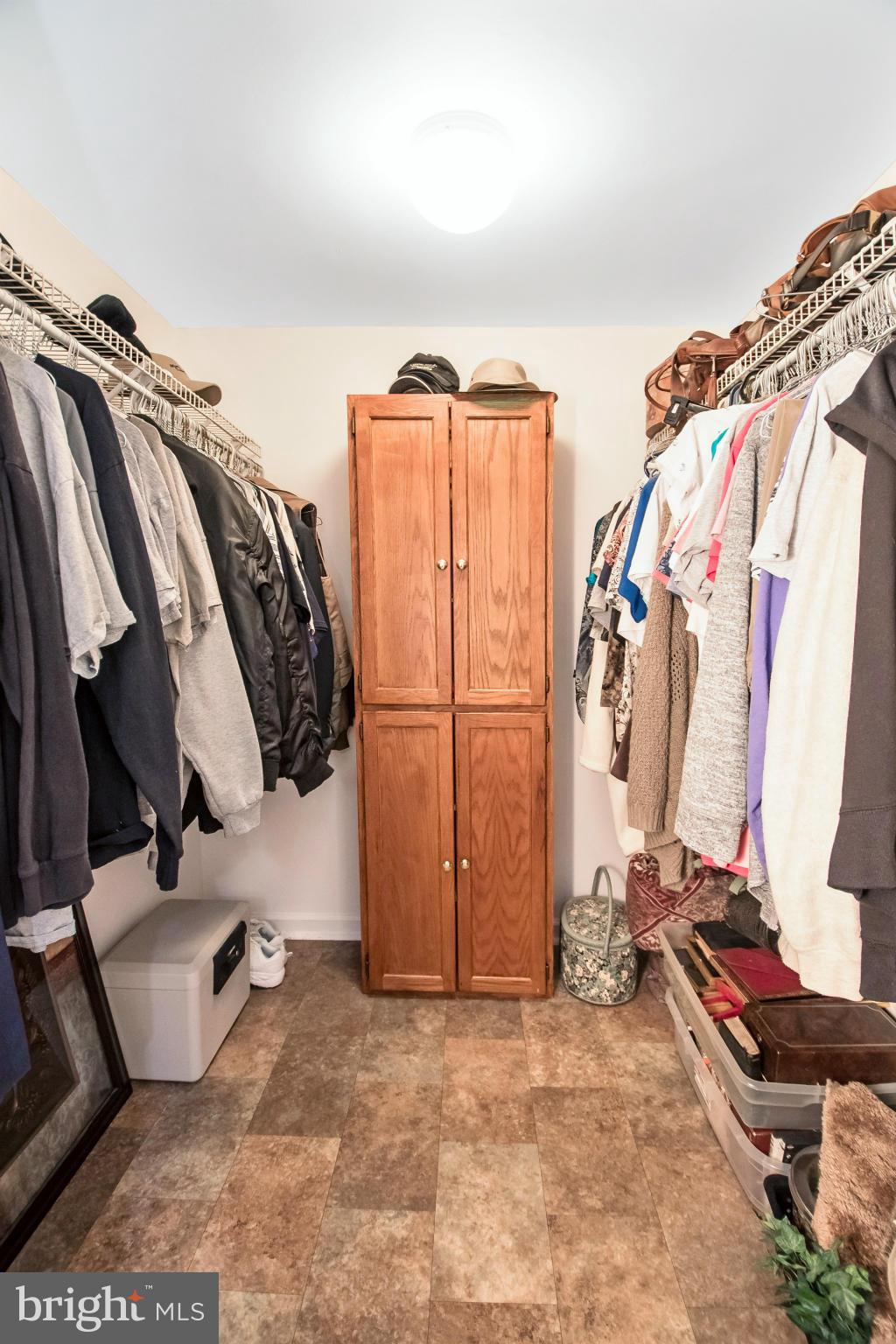 6101 Ridge Tree Road Fredericksburg, VA 22407 - Photo 28 of 30 a view of walk in closet with clothes and shoes