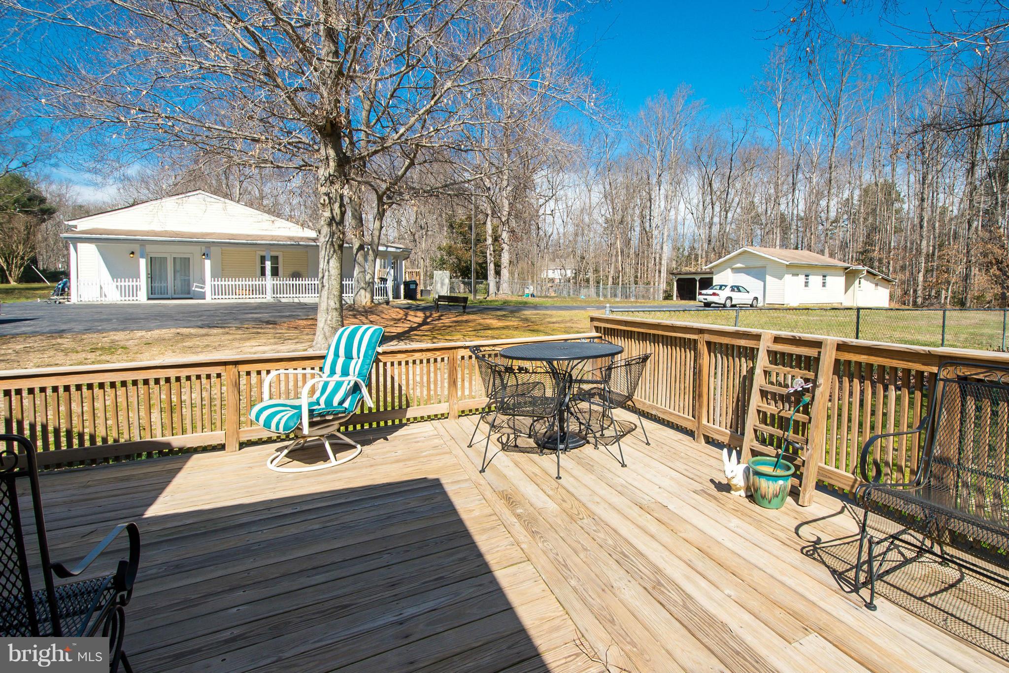 6101 Ridge Tree Road Fredericksburg, VA 22407 - Photo 8 of 30 a view of a chairs and table on the wooden floor