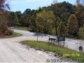 0 Riley Ridge Waynesville, NC 28785 - Photo 2 of 5 a view of a bench in a park