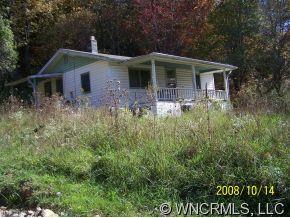 0 Riley Ridge Waynesville, NC 28785 - Photo 5 of 5 a front view of house with yard and trees around