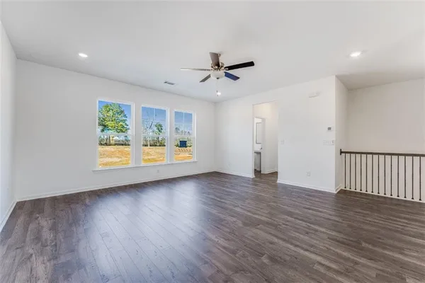 a view of entryway with wooden floor