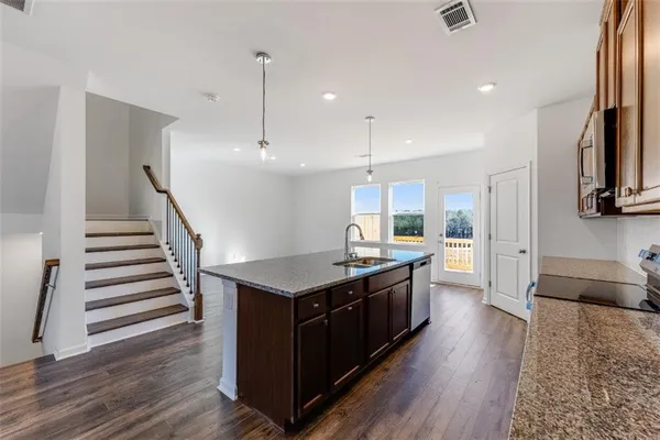 a view of a livingroom with wooden floor