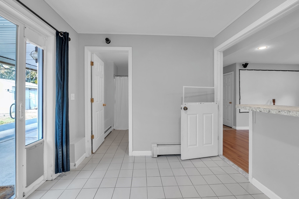 133 Derby Street Worcester, MA 01604 - Photo 31 of 42 a view of a hallway with closet and utility room