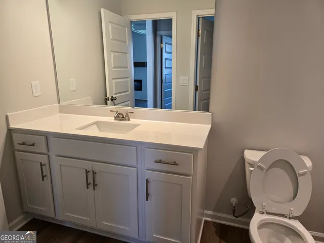 a view of entryway with wooden floor