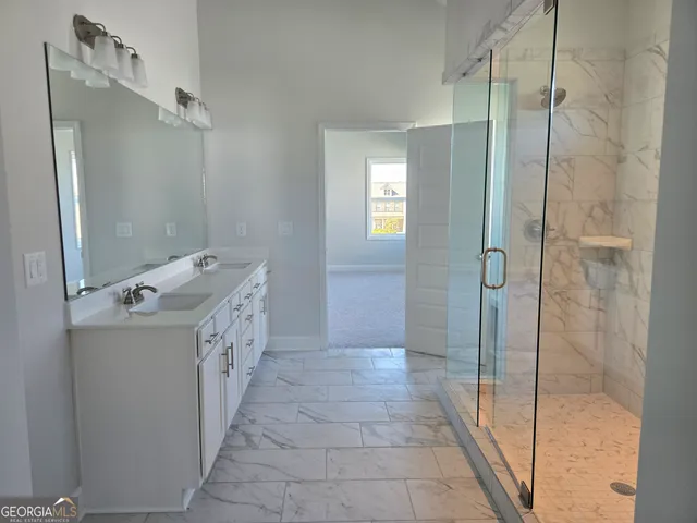 a view of multiple houses with a swimming pool