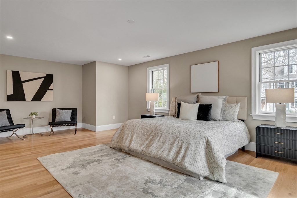 17 Hamilton Road Lexington, MA 02420 - Photo 21 of 42 a bedroom with a large bed and a window