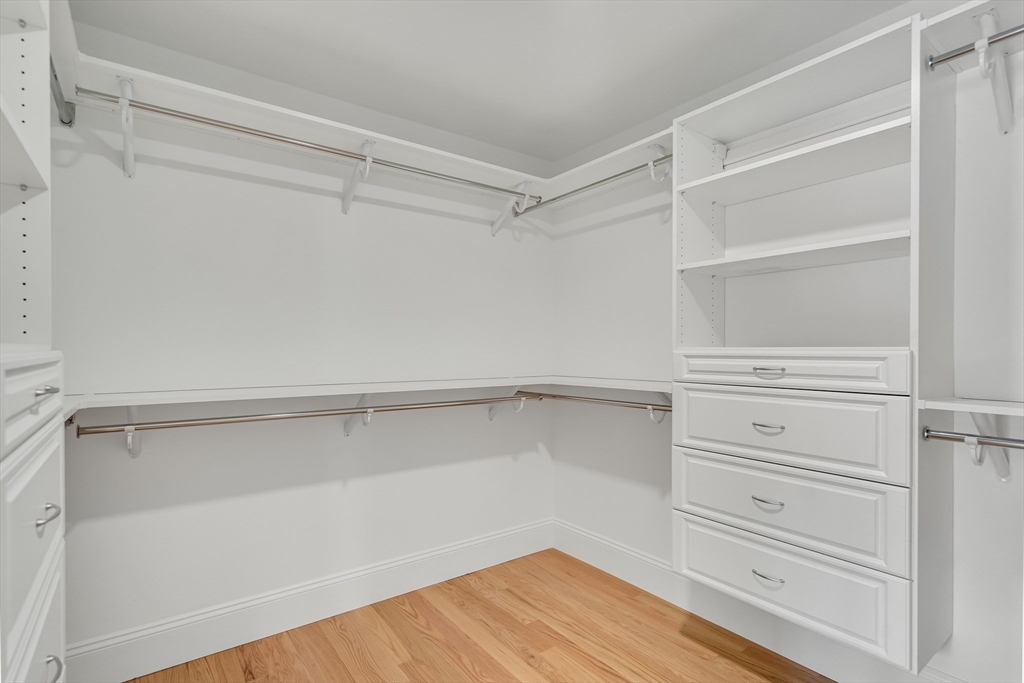17 Hamilton Road Lexington, MA 02420 - Photo 23 of 42 a view of walk in closet with empty racks