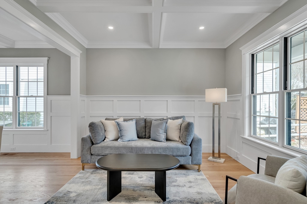 17 Hamilton Road Lexington, MA 02420 - Photo 3 of 42 a living room with furniture and a large window