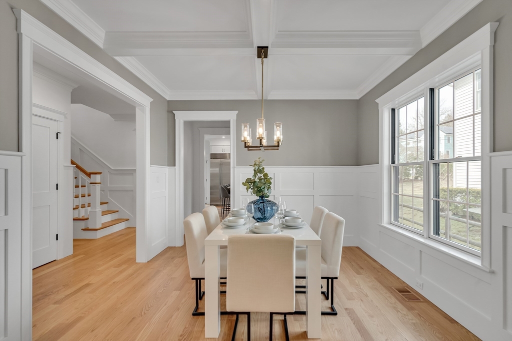 17 Hamilton Road Lexington, MA 02420 - Photo 7 of 42 a dining room with furniture a chandelier and wooden floor