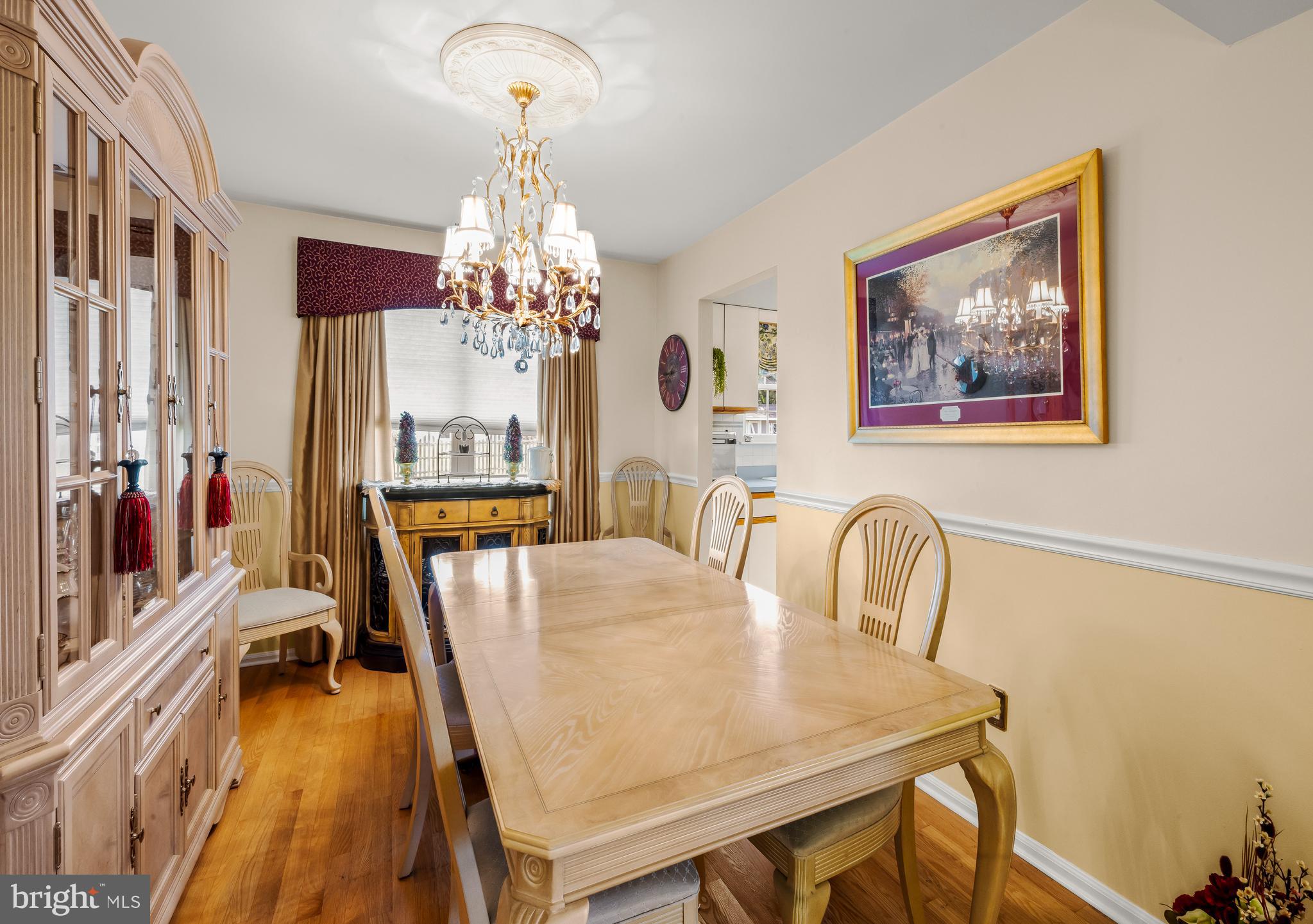 22 Trapper Road Sewell, NJ 08080 - Photo 4 of 20 a view of a dining room with furniture a chandelier and wooden floor