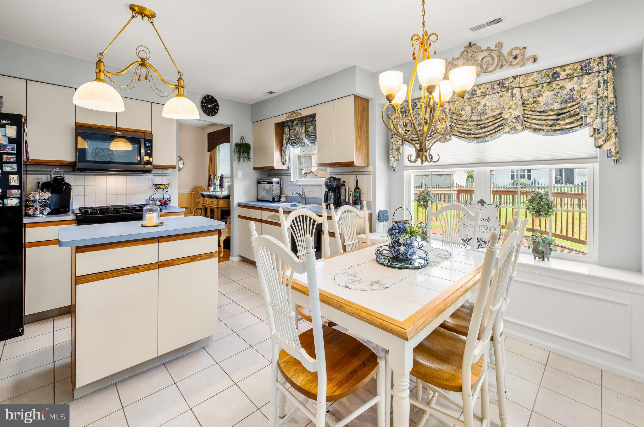 22 Trapper Road Sewell, NJ 08080 - Photo 6 of 20 a kitchen that has a table and chairs in it