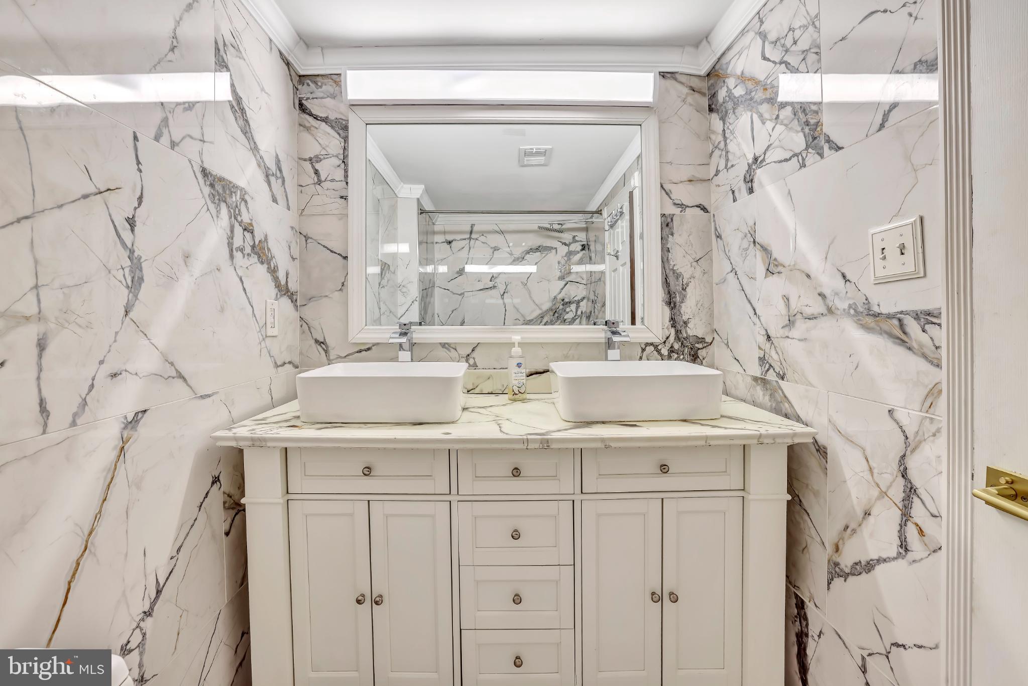 1475 Mt Holly Road, Unit O4 Beverly, NJ 08010 - Photo 13 of 18 a bathroom with a sink vanity and a mirror