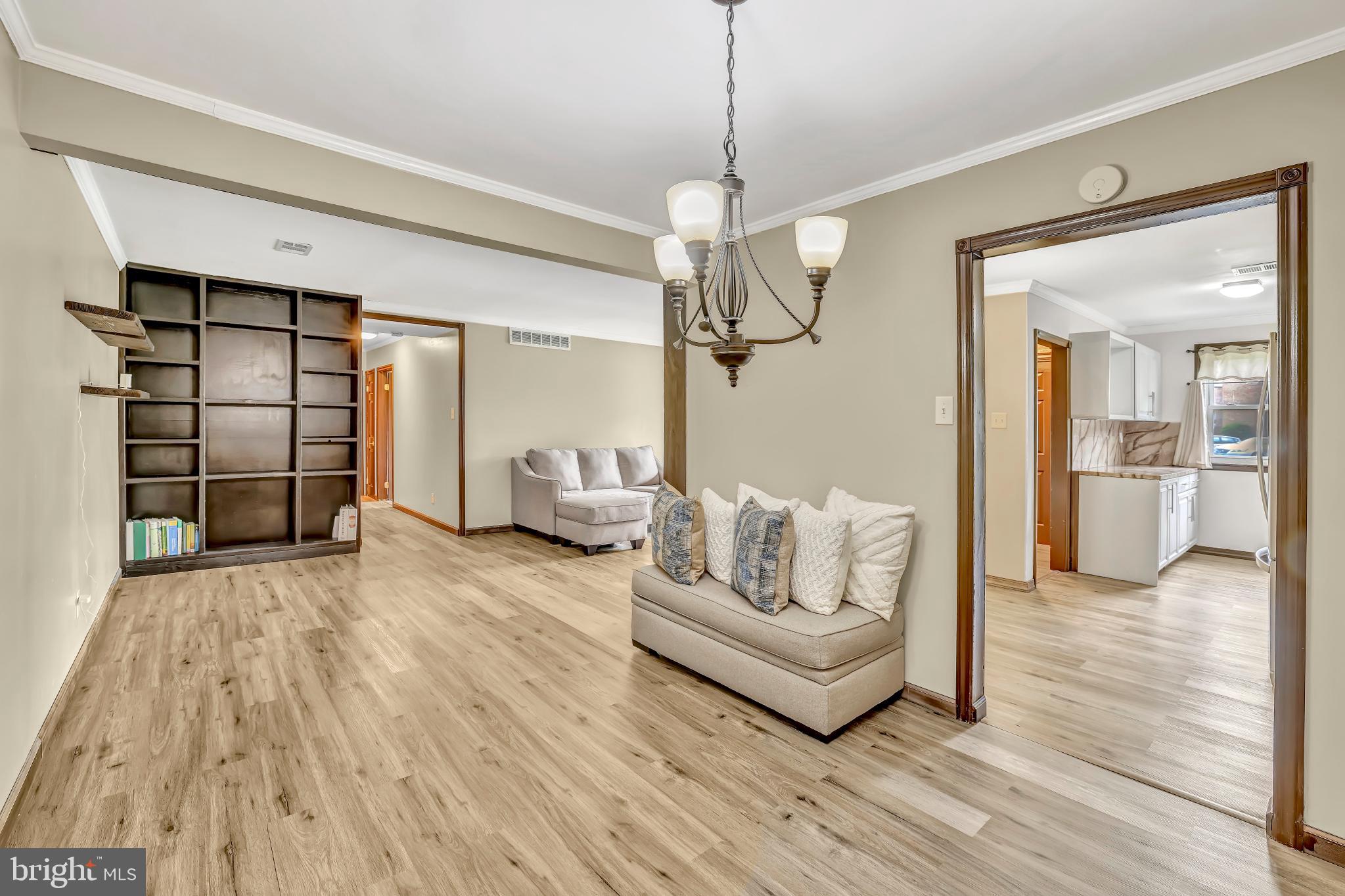1475 Mt Holly Road, Unit O4 Beverly, NJ 08010 - Photo 6 of 18 a living room with furniture and wooden floor