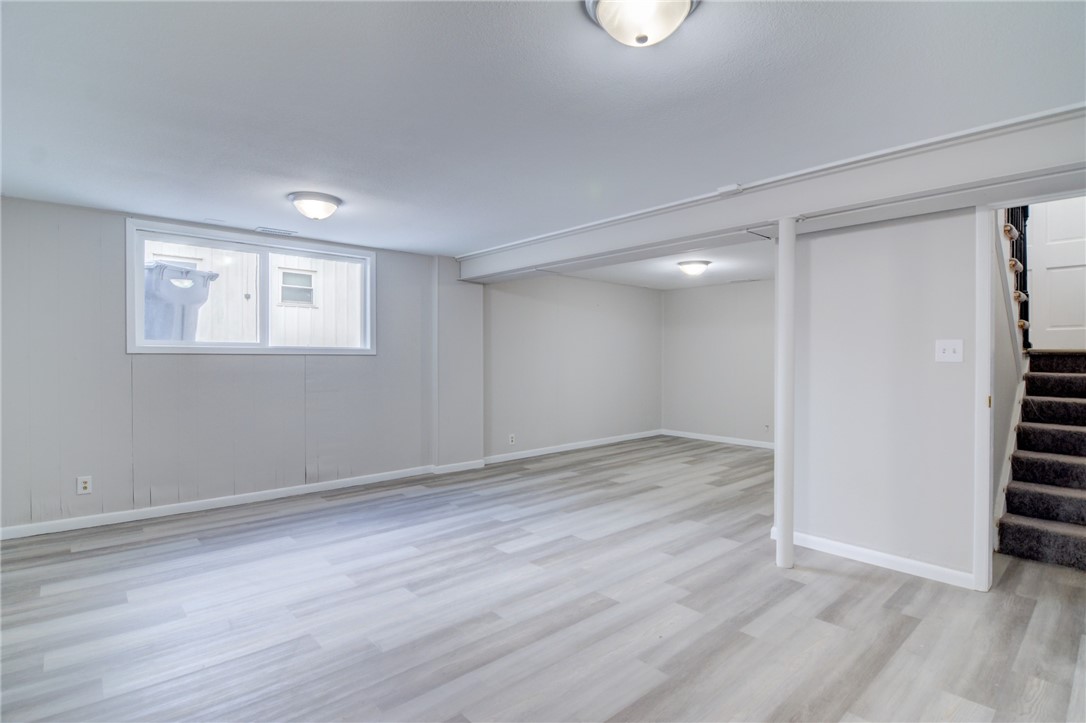 35 Whippoorwill Drive Decatur, IL 62526 - Photo 20 of 33 a view of an empty room with wooden floor and a window