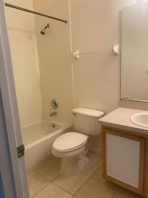 9323 Flowering Cottonwood Road Orlando, FL 32832 - Photo 19 of 23 a bathroom with a sink a toilet and shower
