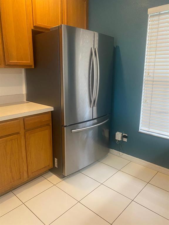 9323 Flowering Cottonwood Road Orlando, FL 32832 - Photo 7 of 23 a utility room with dryer and washer