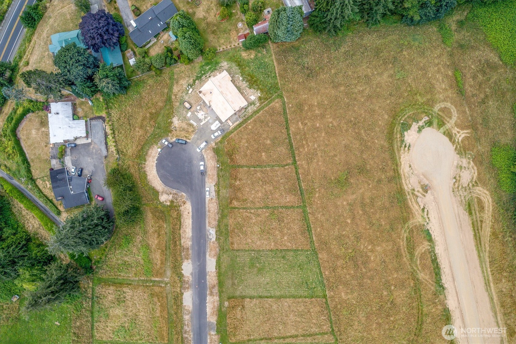 19 Anchor Way, Unit LOT 8 Cathlamet, WA 98612 - Photo 15 of 17 a bathroom with a sink and mirror