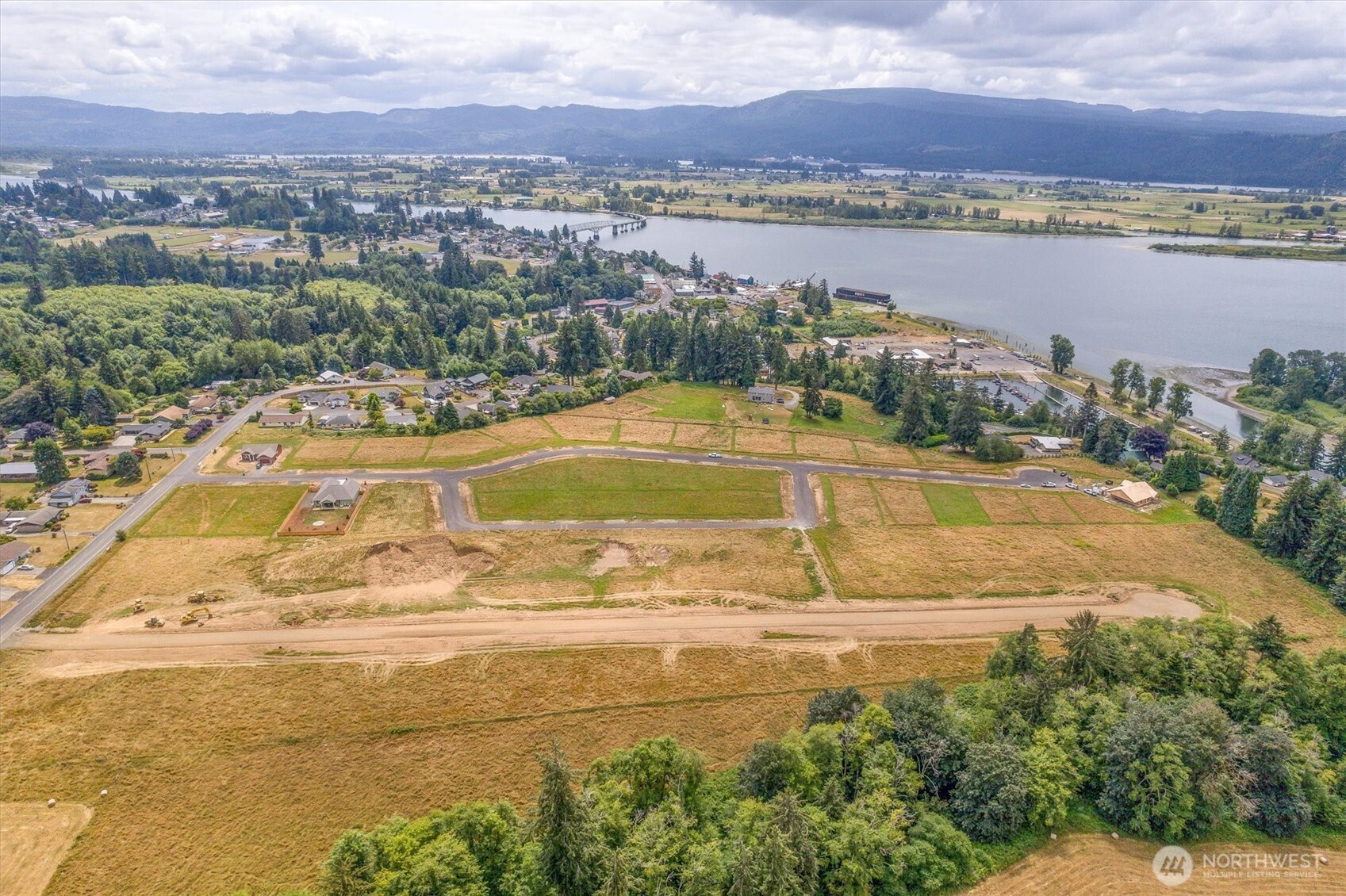 19 Anchor Way, Unit LOT 8 Cathlamet, WA 98612 - Photo 4 of 17 a view of a city with an ocean view