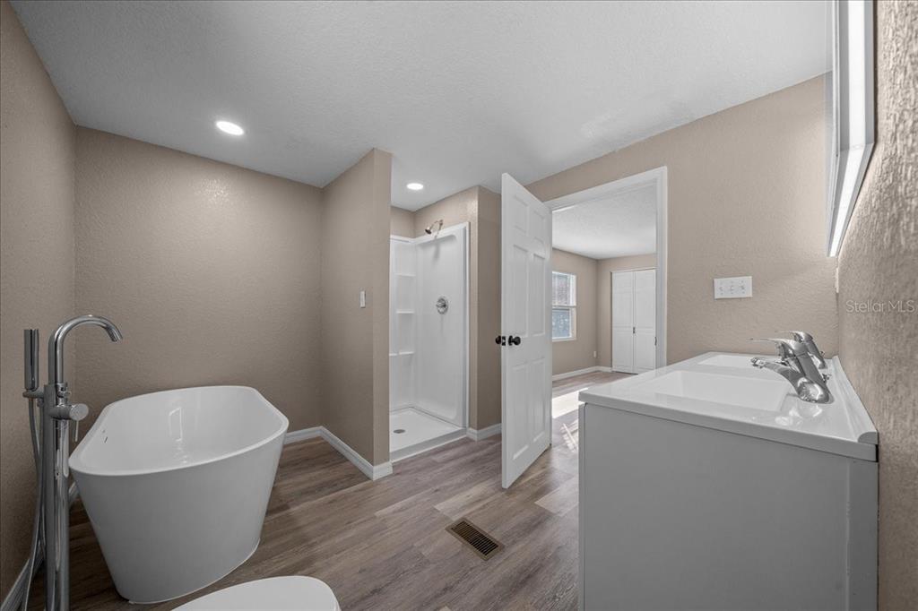 339 Southwest 83rd Street Ocala, FL 34476 - Photo 20 of 34 a bathroom with a sink and mirror