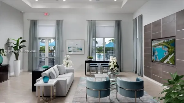 a living room with furniture a flat screen tv and a large window