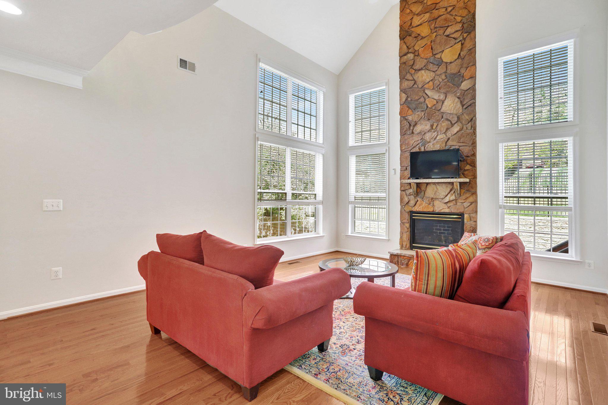 6247 Rolling Spring Court Springfield, VA 22152 - Photo 16 of 52 a living room with furniture and a large window