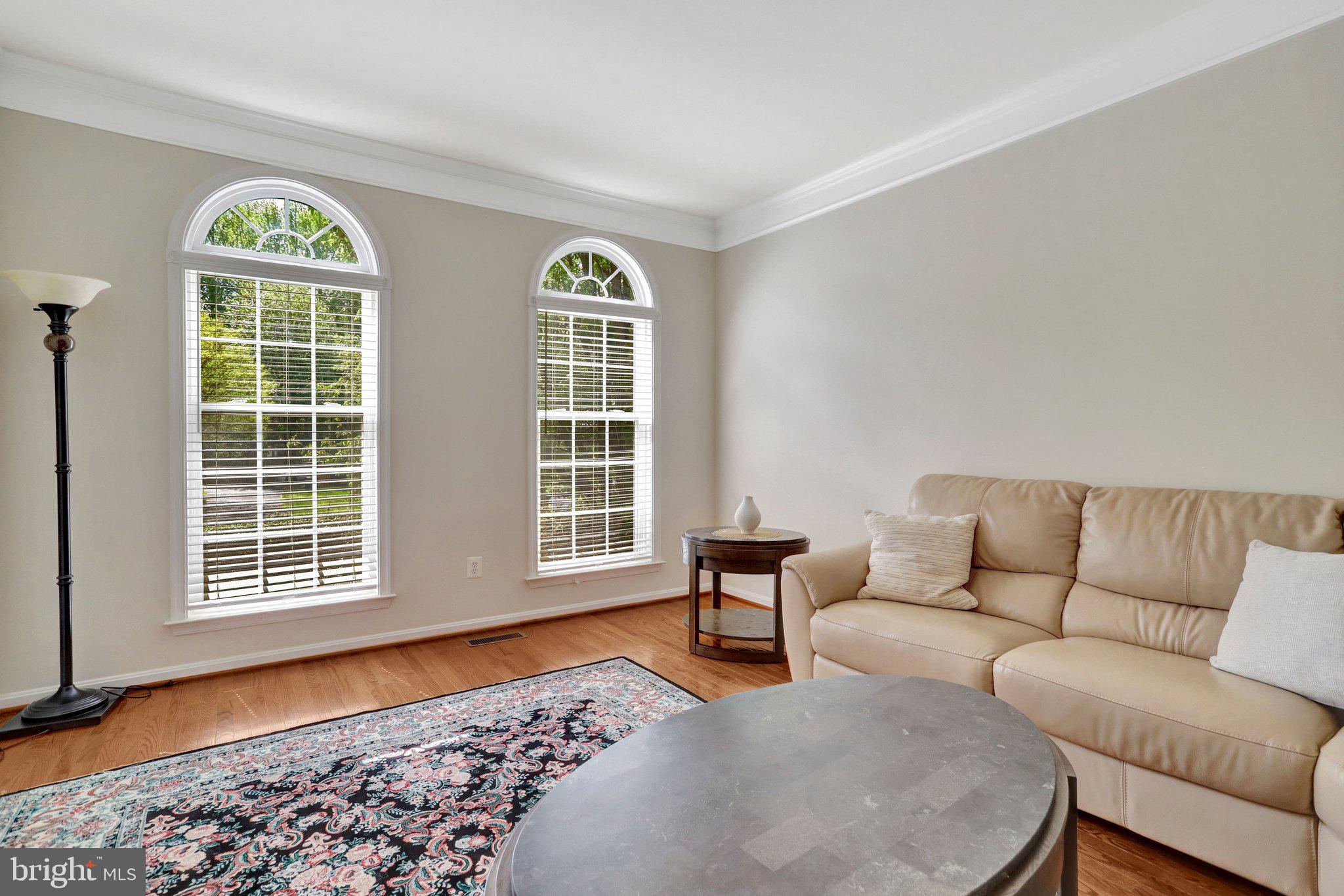 6247 Rolling Spring Court Springfield, VA 22152 - Photo 4 of 52 a living room with furniture and a window