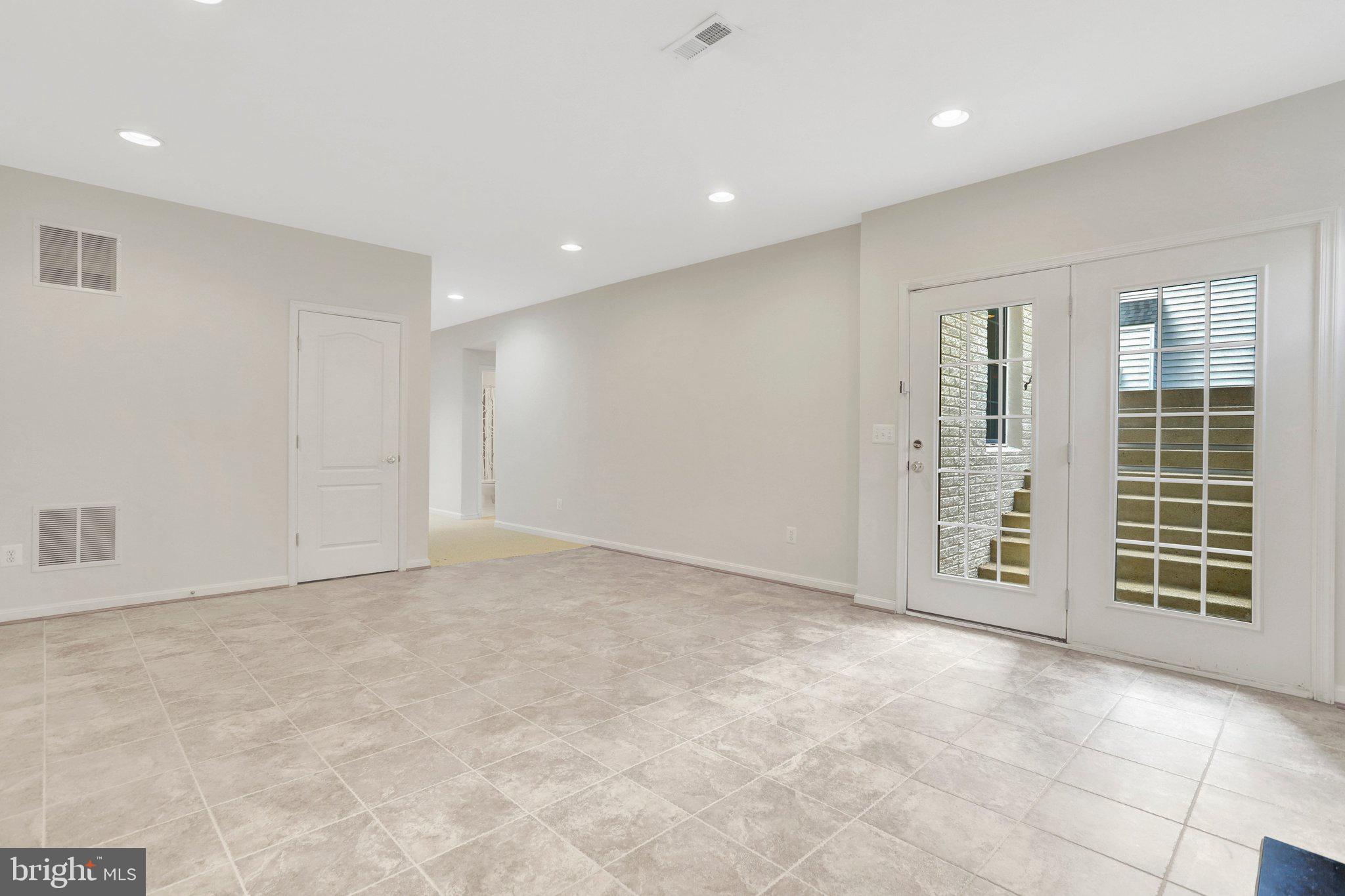 6247 Rolling Spring Court Springfield, VA 22152 - Photo 41 of 52 a view of an empty room with windows