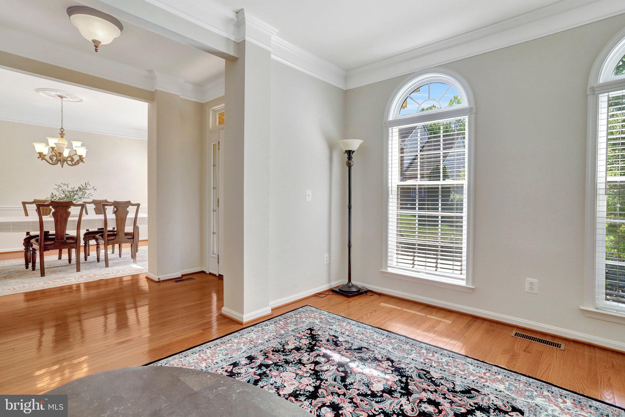 6247 Rolling Spring Court Springfield, VA 22152 - Photo 6 of 52 a living room with furniture and a window