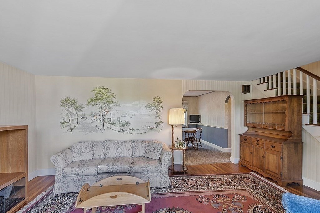 338 Donohue Road Dracut, MA 01826 - Photo 11 of 38 a living room with furniture and a rug