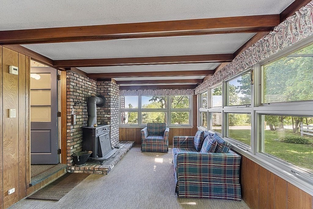 338 Donohue Road Dracut, MA 01826 - Photo 22 of 38 a living room with furniture and windows
