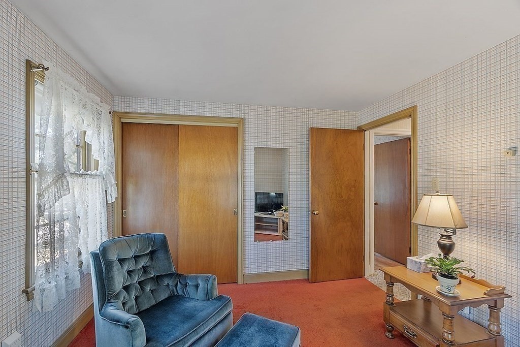 338 Donohue Road Dracut, MA 01826 - Photo 24 of 38 a bedroom with furniture and a window