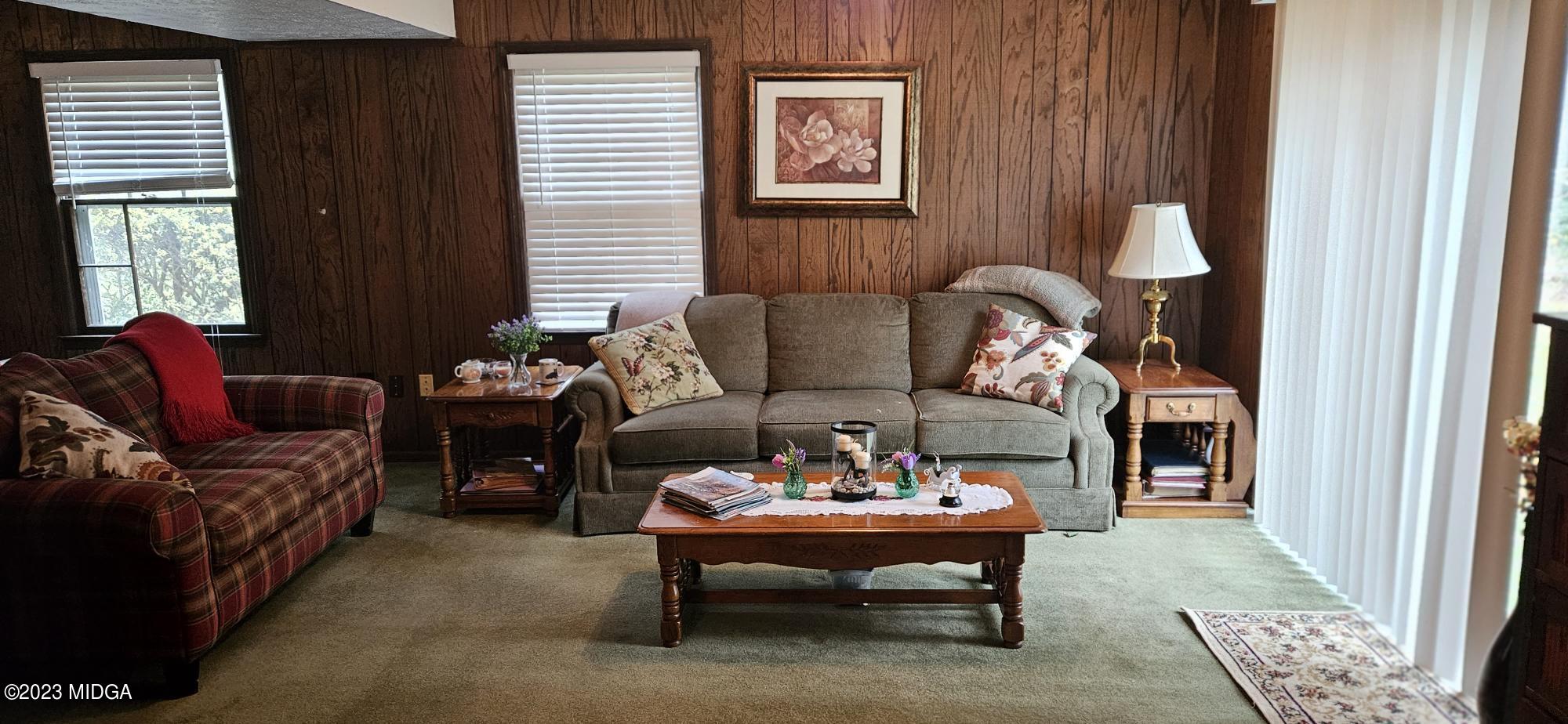 196 Candler Road Gray, GA 31032 - Photo 13 of 16 a living room with furniture and a window