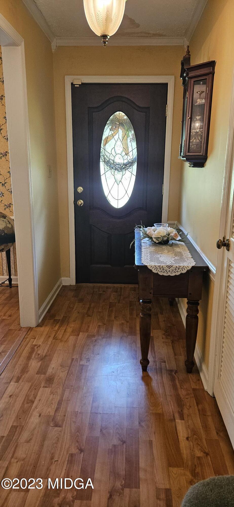 196 Candler Road Gray, GA 31032 - Photo 2 of 16 a view of a room with a table and a mirror