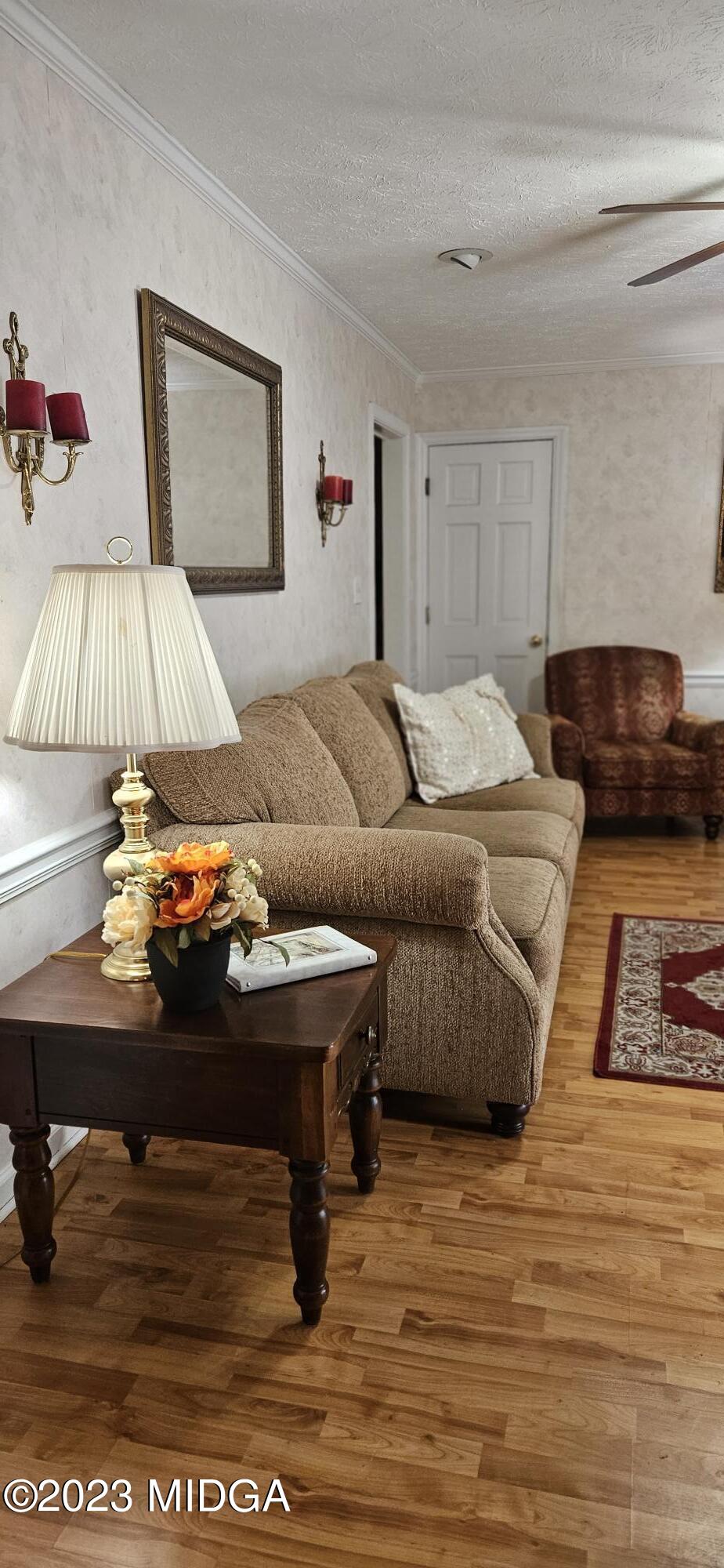 196 Candler Road Gray, GA 31032 - Photo 9 of 16 a living room with furniture and a lamp