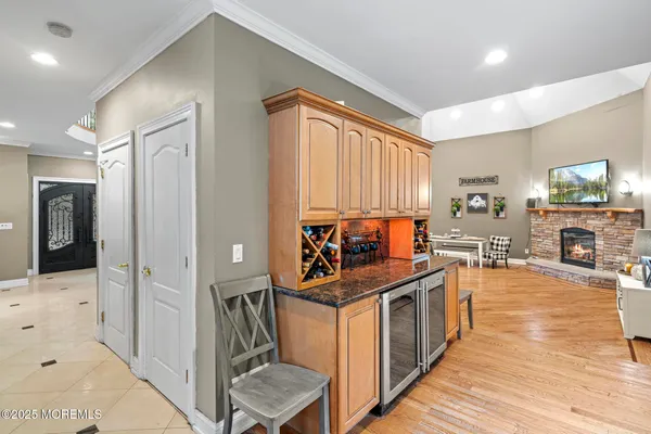a kitchen with stainless steel appliances granite countertop a stove and a refrigerator