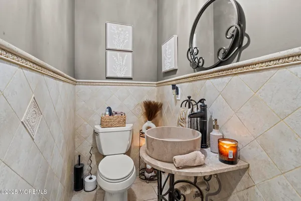 a bathroom with a toilet and a sink