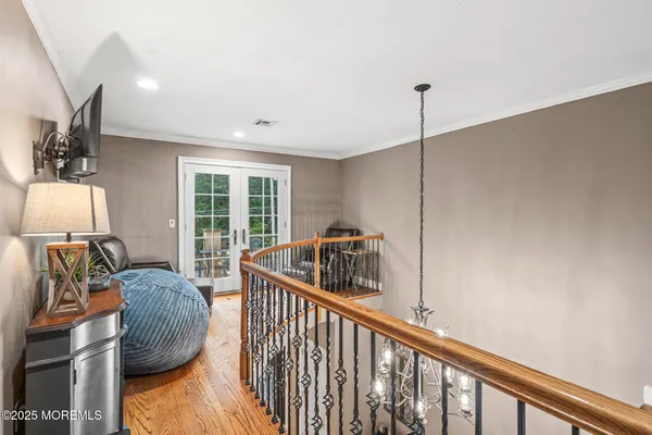 a view of living room with furniture and floor to ceiling window